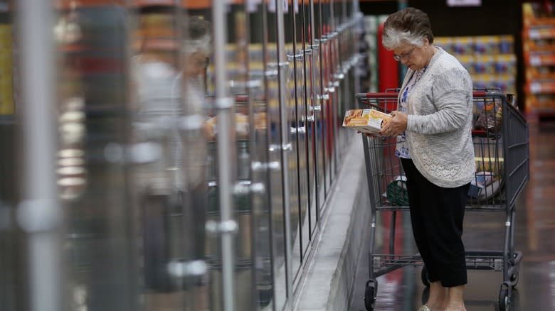 women in Costco frozen aisle