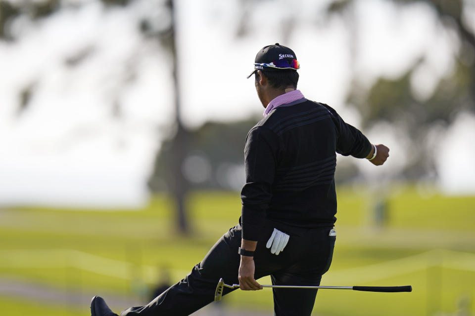 Hideki Matsuyama, of Japan, reacts after just missing a putt on the sixth green of the South Course during the first round of the Farmers Insurance Open golf tournament at Torrey Pines, Thursday, Jan. 28, 2021, in San Diego. (AP Photo/Gregory Bull)