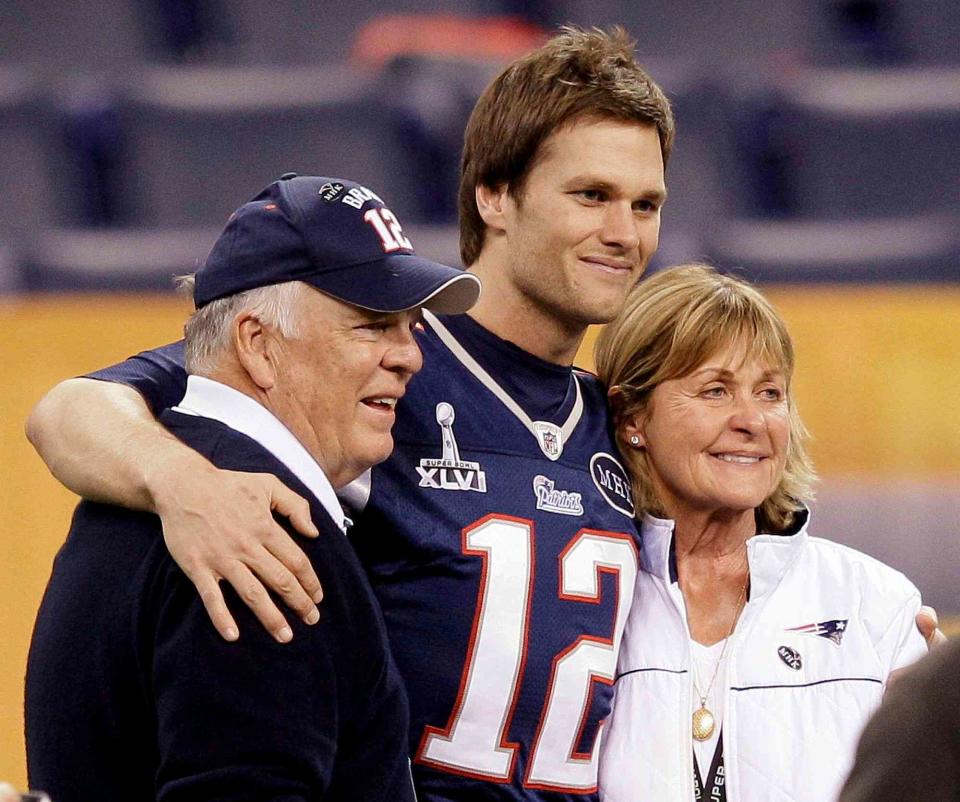 Mark Humphrey/AP/Shutterstock Tom Brady and his parents