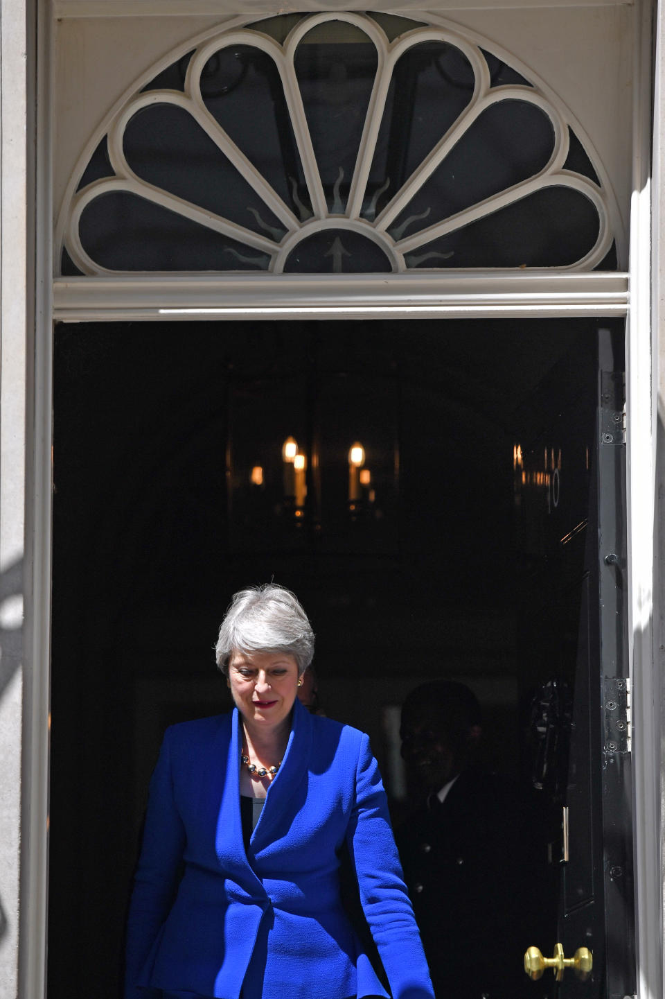 Outgoing Prime Minister Theresa May leaves 10 Downing Street, prior to a meeting at Buckingham Palace where she will hand in her resignation to Queen Elizabeth II.