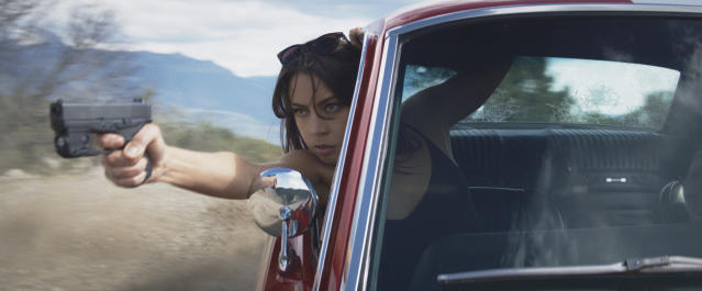 This image released by Lionsgate shows Aubrey Plaza in a scene from "Operation Fortune: Ruse de Guerre." (Daniel Smith/Lionsgate via AP)