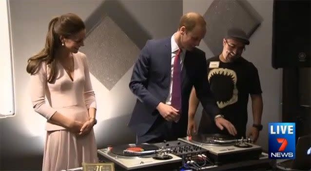 Prince William gets a crash course lesson in using the turntables at Northern Sound System. Photo: 7News.