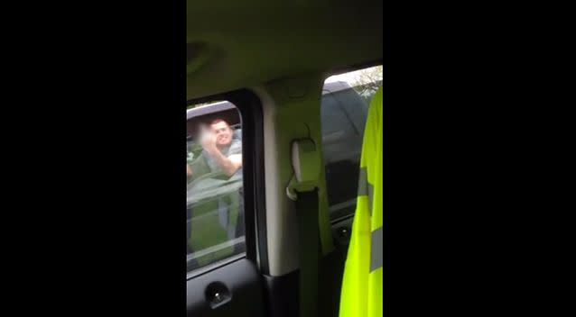 The angry driver decided to pull up next to the woman and flip her the bird. Photo: Youtube