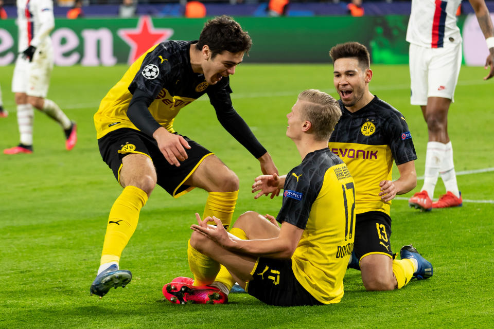 Erling Haaland (seated) and American teen Giovani Reyna (left) are two of many reasons to watch Borussia Dortmund and the Bundesliga when it returns this month. (DeFodi Images/Getty Images)