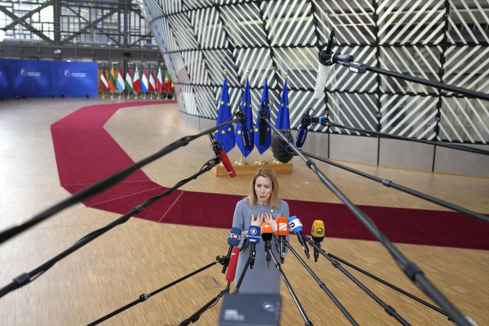 Estonia's Prime Minister Kaja Kallas speak with the media as she arrives for an EU summit at the European Council building in Brussels, Belgium, on Thursday, Feb. 9, 2023. European Union leaders are meeting for an EU summit to discuss Ukraine and migration. (AP Photo/Virginia Mayo)