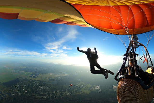 <p>Operation Solutions</p> Larry Connor jumps from a balloon from 8,000 ft feet during Alpha 5 canopy control training in Palm Bay, FL on July 18, 2023