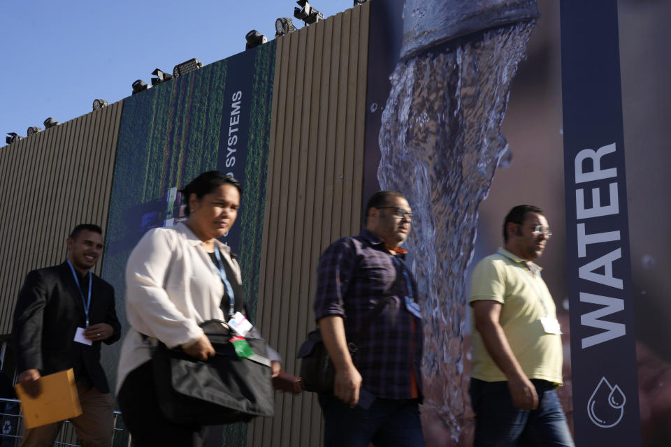 People arrive at the COP27 U.N. Climate Summit arrive on Sunday, Nov. 6, 2022, in Sharm el-Sheikh, Egypt. (AP Photo/Peter Dejong)