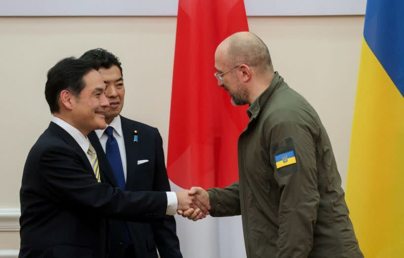 Ukrainian Prime Minister Denys Shmyhal greets the Japanese delegation at a meeting on Ukraine's economic recovery in Kyiv, Ukraine, on Nov. 20, 2023. (Ukrainian government's press service)