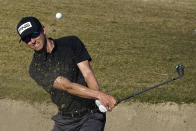 Brandon Hagy hits from the bunker to the 17th green during the first round of The American Express golf tournament on the Nicklaus Tournament Course at PGA West, Thursday, Jan. 21, 2021, in La Quinta, Calif. (AP Photo/Marcio Jose Sanchez)