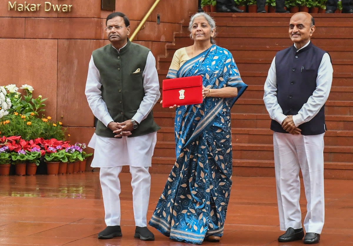 India’s Finance Minister Nirmala Sitharaman holds up the file containing the country’s interim budget 2024 (PIB/AFP via Getty Images)