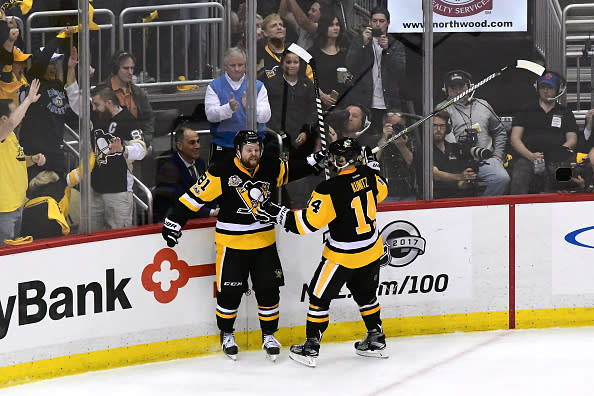 PITTSBURGH, PA - MAY 15: Phil Kessel #81 of the Pittsburgh Penguins celebrates with Chris Kunitz #14 after scoring a goal against Craig Anderson #41 of the Ottawa Senators during the third period in Game Two of the Eastern Conference Final during the 2017 NHL Stanley Cup Playoffs at PPG PAINTS Arena on May 15, 2017 in Pittsburgh, Pennsylvania. (Photo by Matt Kincaid/Getty Images)