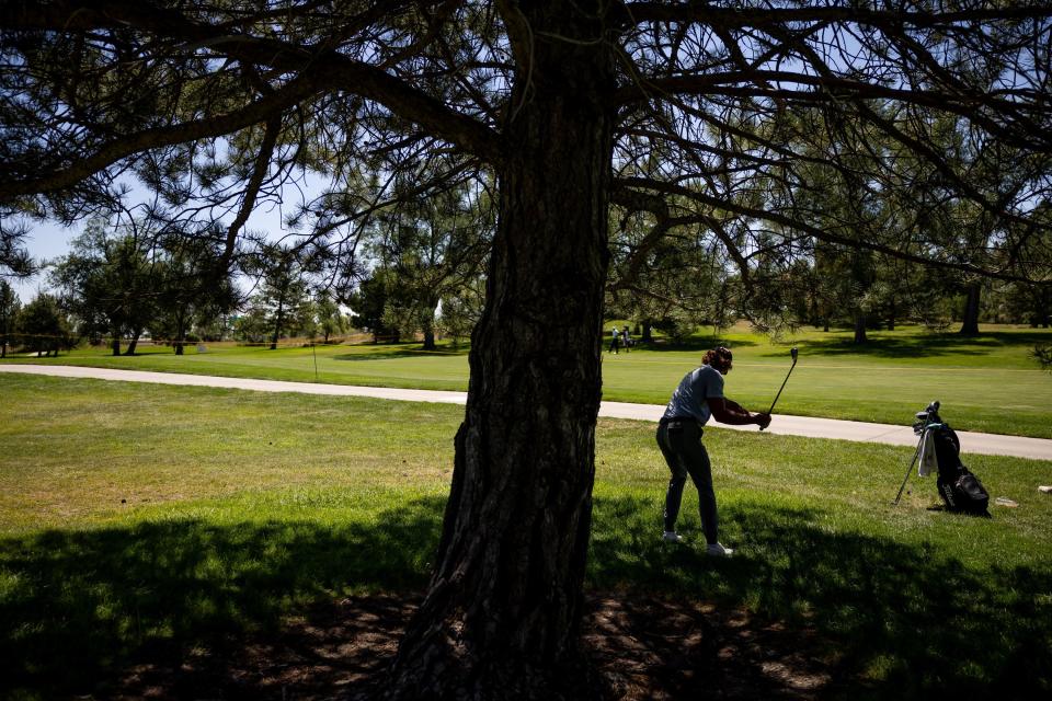 Carson Lundell hits from under a tree during the Utah Championship, part of the PGA Korn Ferry Tour, at Oakridge Country Club in Farmington on Saturday, Aug. 5, 2023. | Spenser Heaps, Deseret News