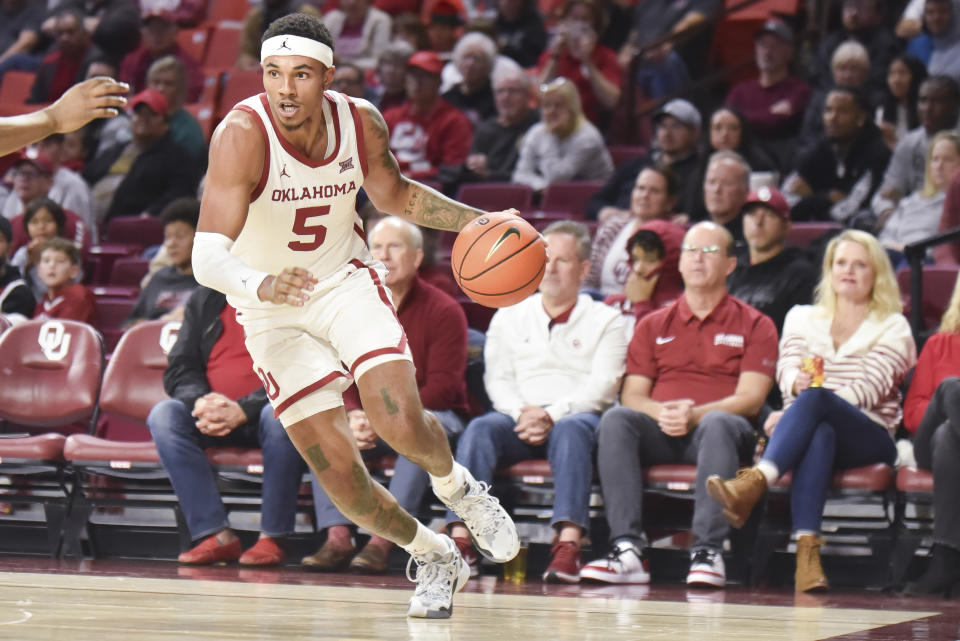 Oklahoma guard Rivaldo Soares drives the basket during the first half of an NCAA college basketball game against Green Bay, Saturday, Dec. 16, 2023, in Norman, Okla. (AP Photo/Kyle Phillips)