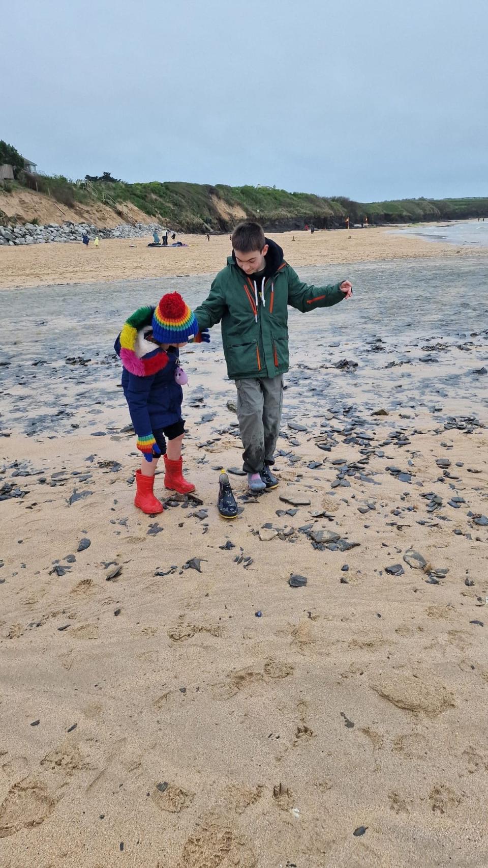 Oran with his sister at the beach (GOSH)