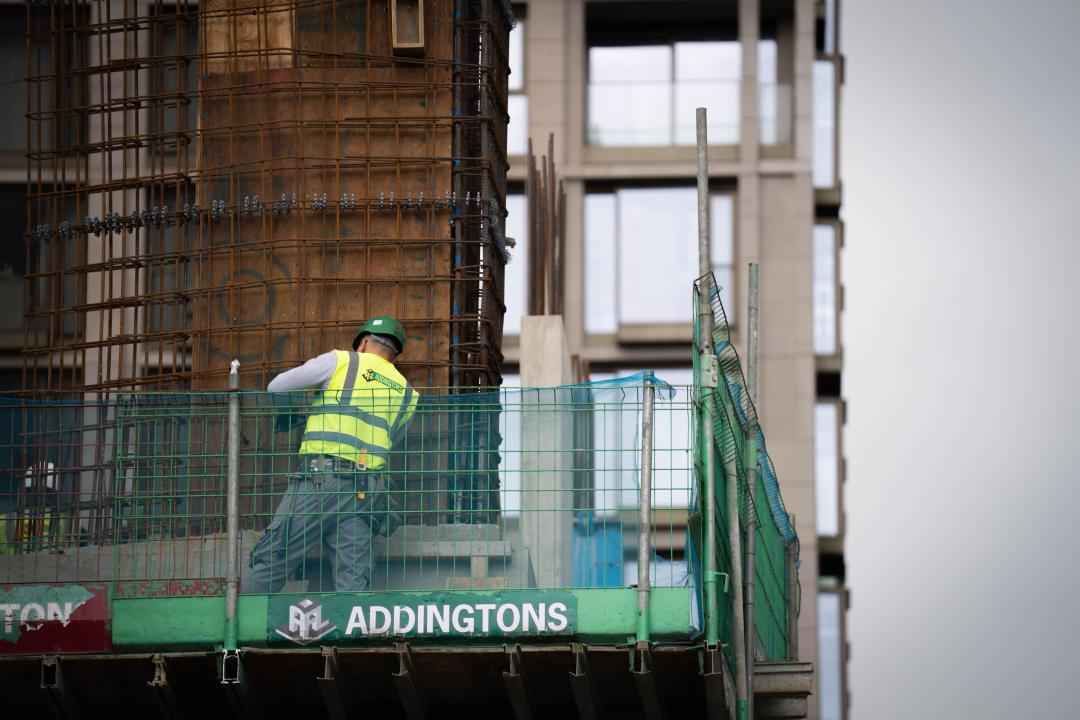 File photo dated 24/07/23 of a construction worker on a building site near South Bank, London. The UK's construction sector contracted heavily last month as the housebuilding sector had one of its worst months since 2009, an influential survey has suggested. Companies said that projects to build homes were being cut back as demand weakens and the cost of borrowing rises. Issue date: Thursday October 5, 2023.