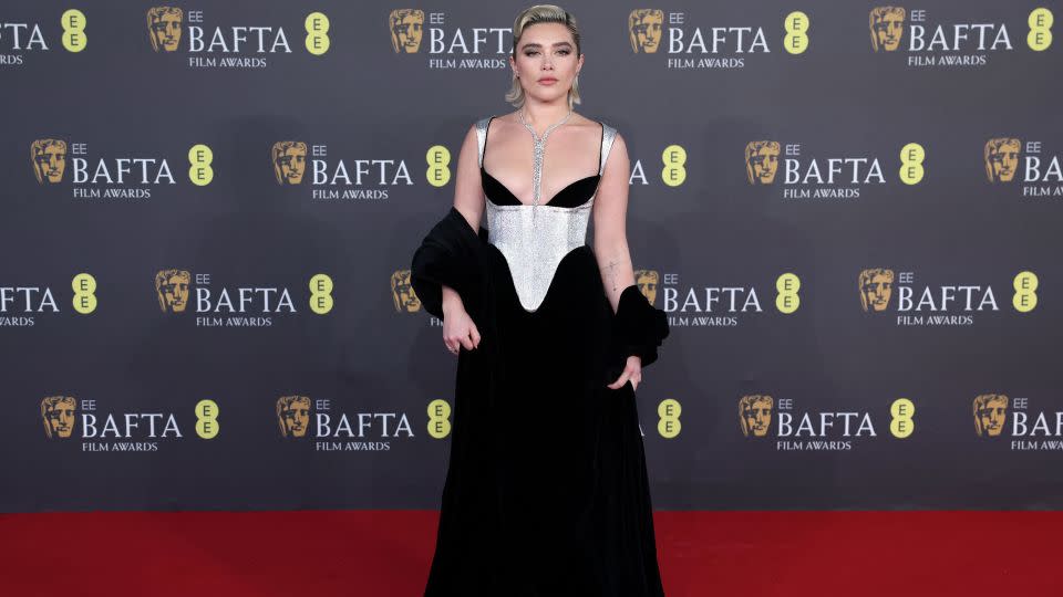 Florence Pugh opted for a Harris Reed dress paired with Boucheron jewelry - Isabel Infantes/Reuters