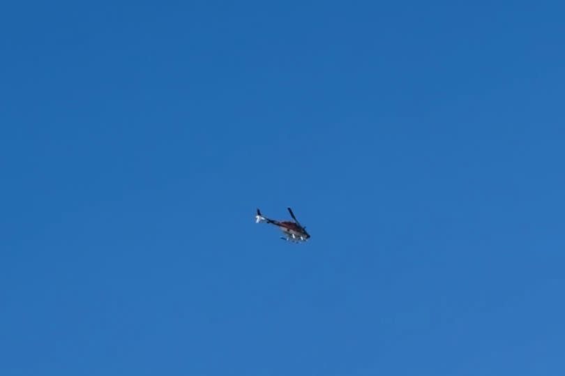 The police helicopter flying over Tenerife