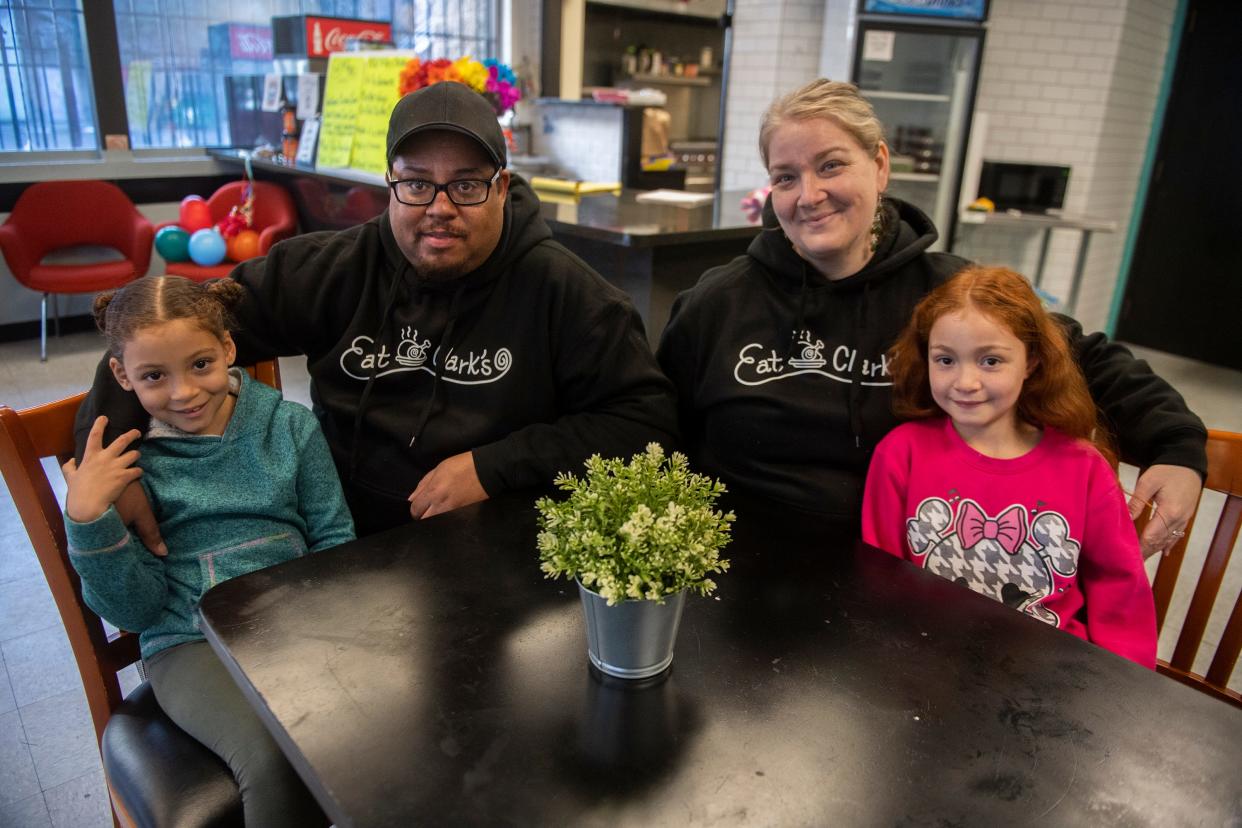 Owners chef Andre and Marissa Clark with their children Zoe, 7, left, and Olivia, 8, (not pictured, son Andre, Jr., 16, at their restaurant Eat at Clark's on Market Street in downtown Stockton, on Friday, Jan. 27, 2023.