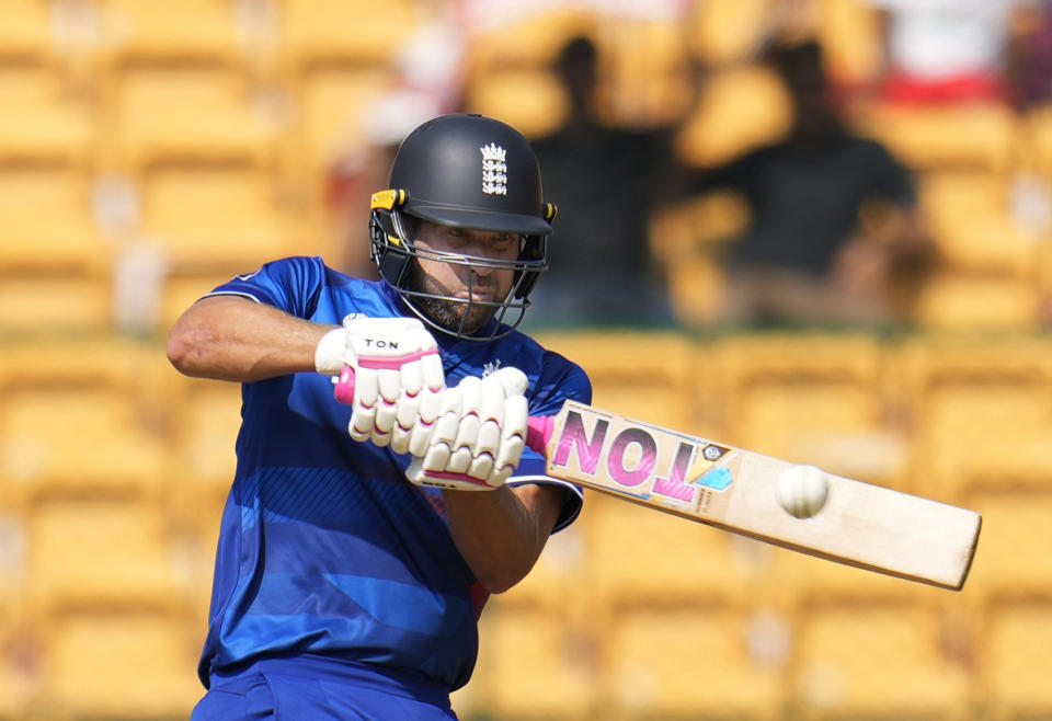 England's Dawid Malan hits a boundary during the ICC Men's Cricket World Cup match between England and Sri Lanka in Bengaluru, India, Thursday, Oct. 26, 2023. (AP Photo/Aijaz Rahi)