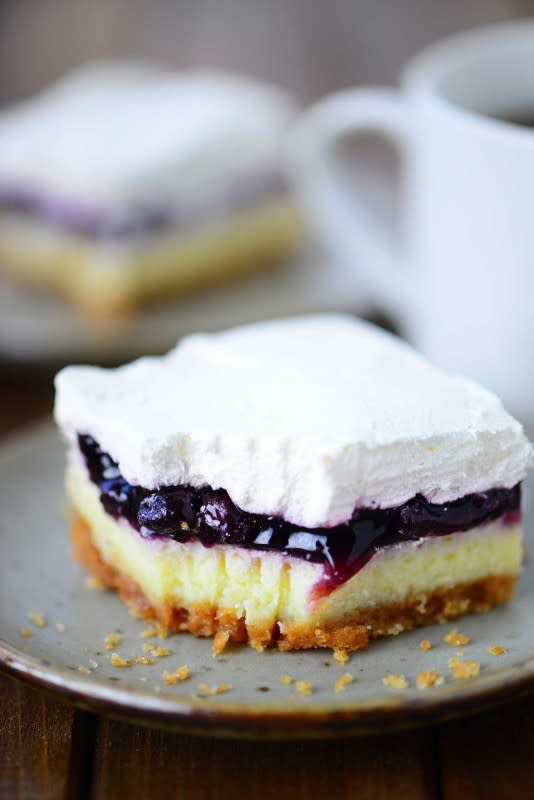 <p>The Gunny Sack</p><p>A dreamy dessert with light, moist cheesecake topped with blueberry pie filling and whipped cream.</p><p><strong>Get the recipe: <a href="https://www.thegunnysack.com/blueberry-cheesecake-dessert-recipe/" rel="nofollow noopener" target="_blank" data-ylk="slk:Blueberry Cheesecake Dessert;elm:context_link;itc:0;sec:content-canvas" class="link ">Blueberry Cheesecake Dessert</a></strong></p>