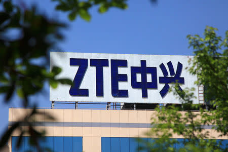 The logo of China's ZTE Corp is seen on a building in Nanjing, Jiangsu province, China April 19, 2018. REUTERS/Stringer