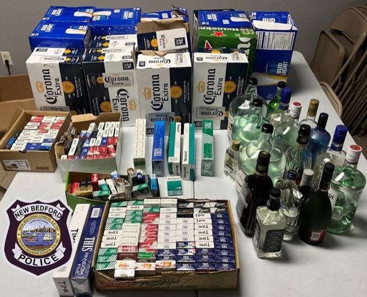 New Bedford Police seized alcohol and cigarettes from an Acushnet Avenue store, charging the owner with selling the items without a license.