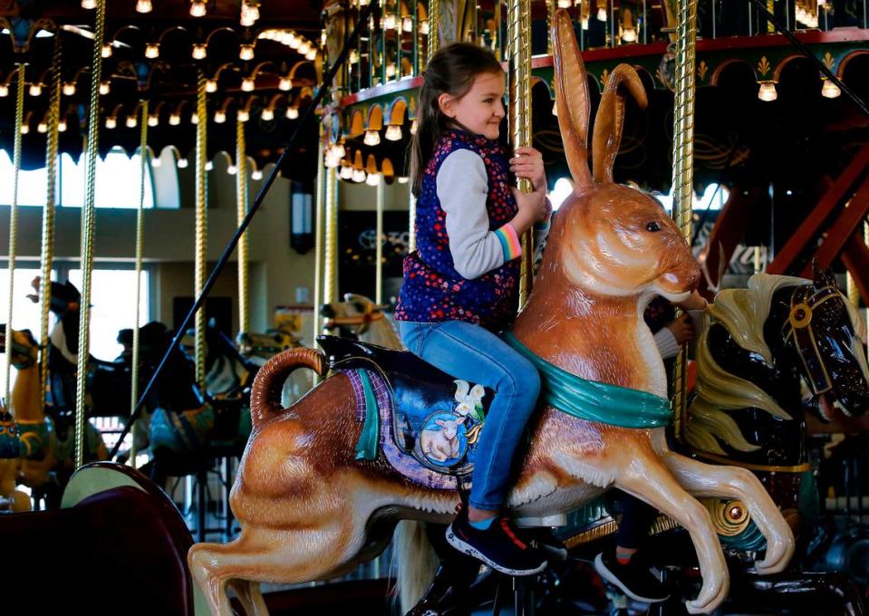 This young visitor lucks out with one of the first rides on the newly installed Easter bunny named Sir Hops-a-Lot at the Gesa Carousel of Dream in Kennewick. The new carving was done by local artist Mike Thorton of Richland and will remain on the carousel through April 24. 