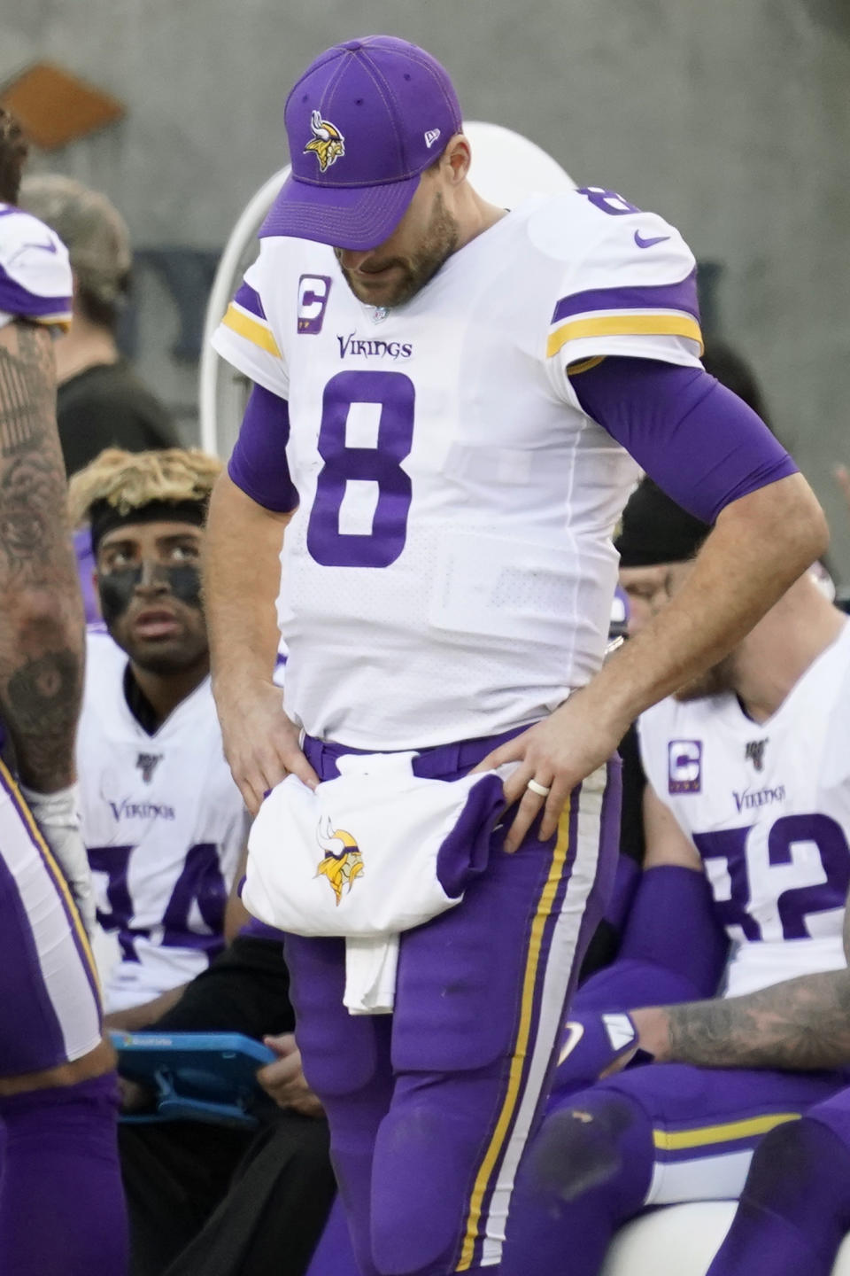 Minnesota Vikings quarterback Kirk Cousins (8) stands on the sideline during the second half of an NFL divisional playoff football game against the San Francisco 49ers, Saturday, Jan. 11, 2020, in Santa Clara, Calif. (AP Photo/Tony Avelar)