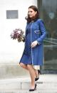 <p>In a lined Jenny Packham blue coat and dress and Jimmy Choo navy heels while visiting the Royal College of Obstetricians and Gynaecologists in London.</p>