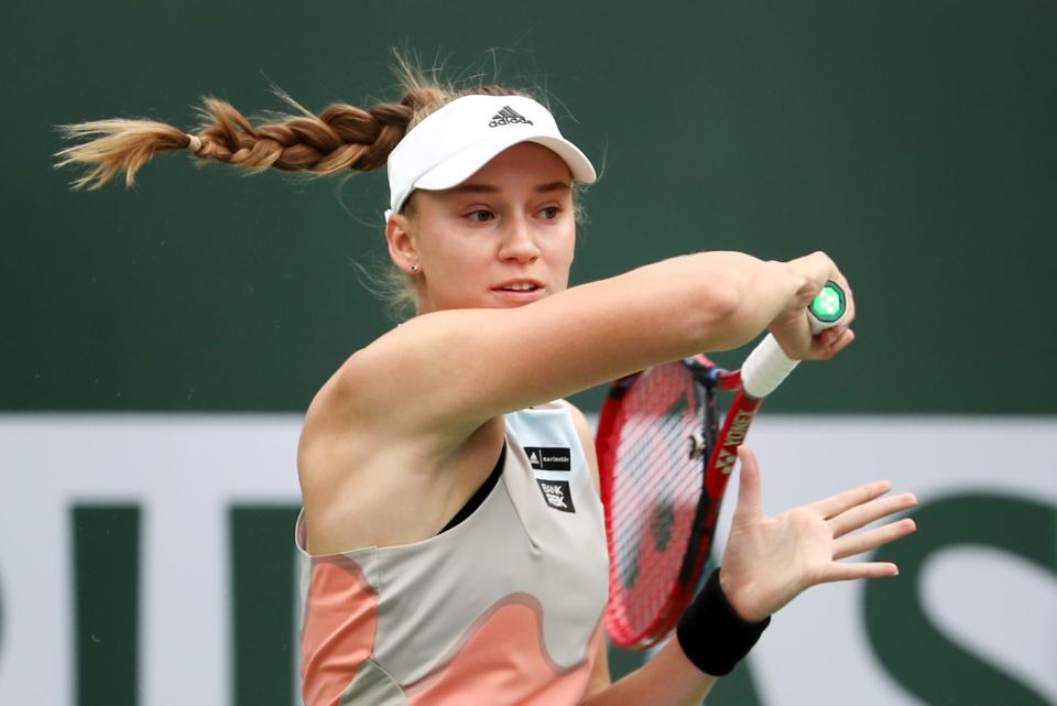 Elena Rybakina of Kazakshstan returns to Aryna Sabalenka of Belarus during their BNP Paribas Open championship match in Indian Wells, Calif., on Sunday, March 19, 2023.