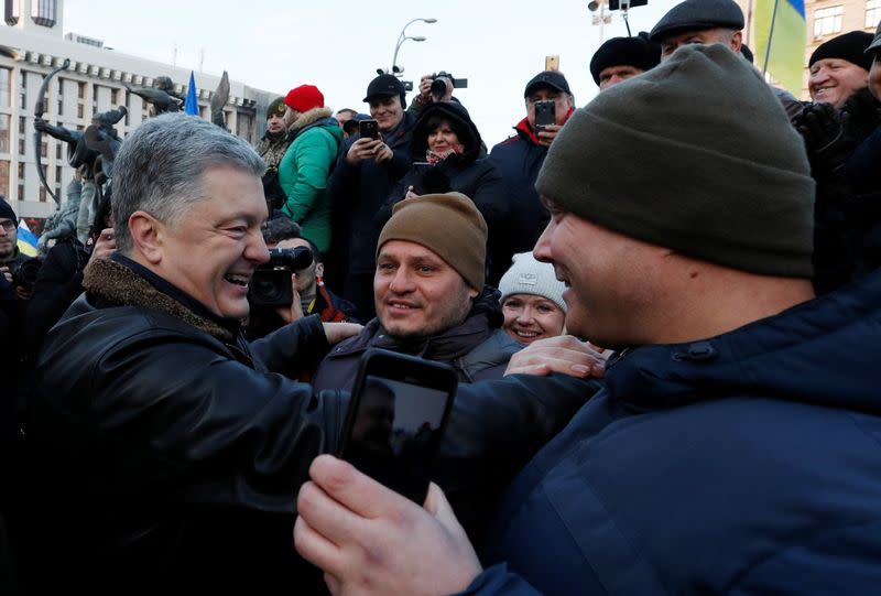 Ukraine's former President Petro Poroshenko takes part in a rally ahead of the so-called "Normandy" format summit, in Kiev