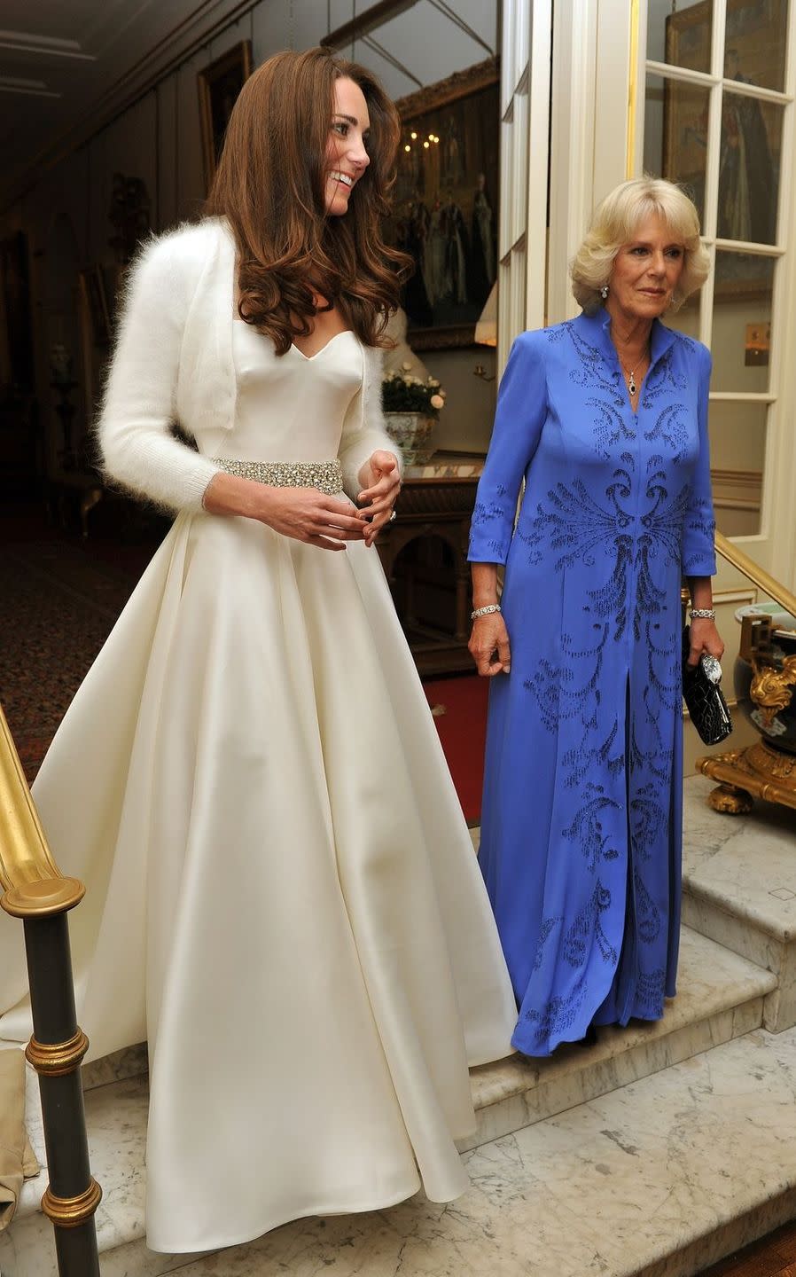 <p>At Prince William and Duchess Kate's wedding reception at Buckingham Palace Camilla sported a long periwinkle gown with cobalt beading. </p>