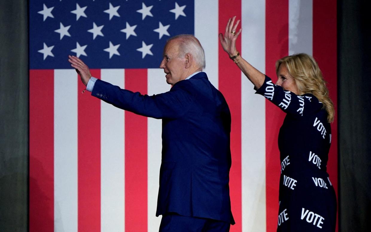 U.S. President Joe Biden and first lady Jill Biden wave as they exit the stage during a campaign rally in Raleigh, North Carolina, U.S., June 28, 2024. REUTERS/Elizabeth Frantz TPX IMAGES OF THE DAY