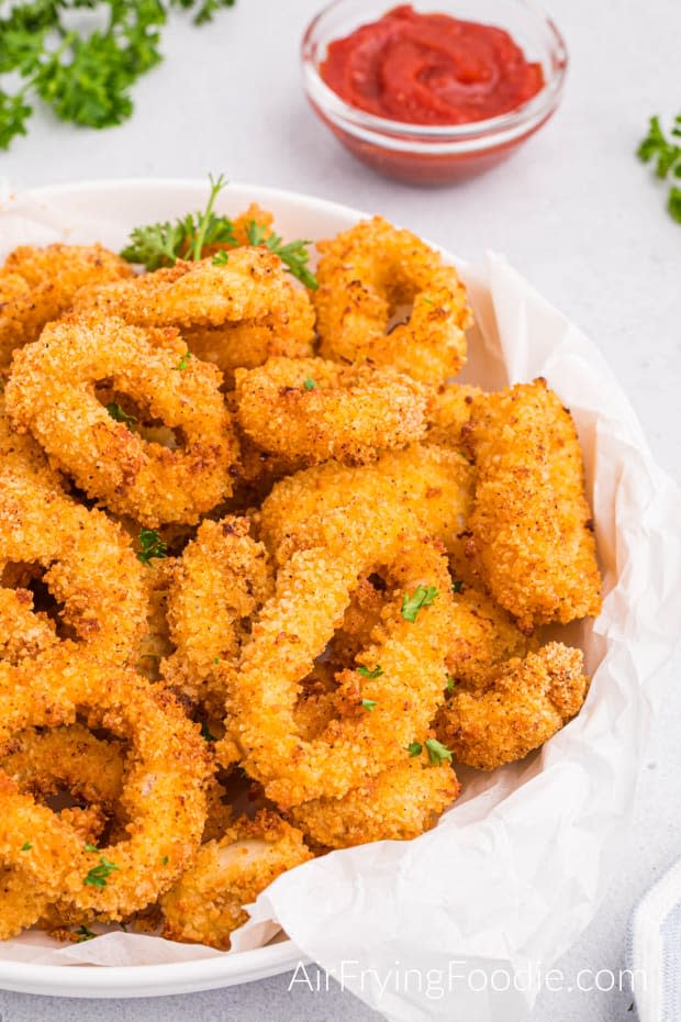 <p><a href="https://airfryingfoodie.com/air-fryer-calamari/" rel="nofollow noopener" target="_blank" data-ylk="slk:Air Frying Foodie;elm:context_link;itc:0;sec:content-canvas" class="link ">Air Frying Foodie</a></p>