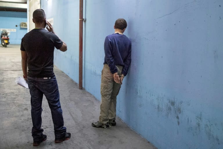 American-Israeli Jewish teenager Michael Kadar, seen here after a March 23, 2017 hearing, has been sentenced to 10 years in prison by an Israeli court after being convicted of making more than 2,000 threats against US Jewish and other institutions