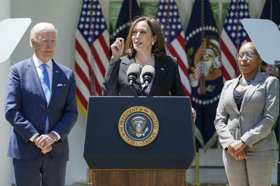 President Joe Biden listens as Vice President Kamala Harris speaks at an event on lowering the cost of high-speed internet in the Rose Garden of the White House, Monday, May 9, 2022, in Washington. (AP Photo/Manuel Balce Ceneta)