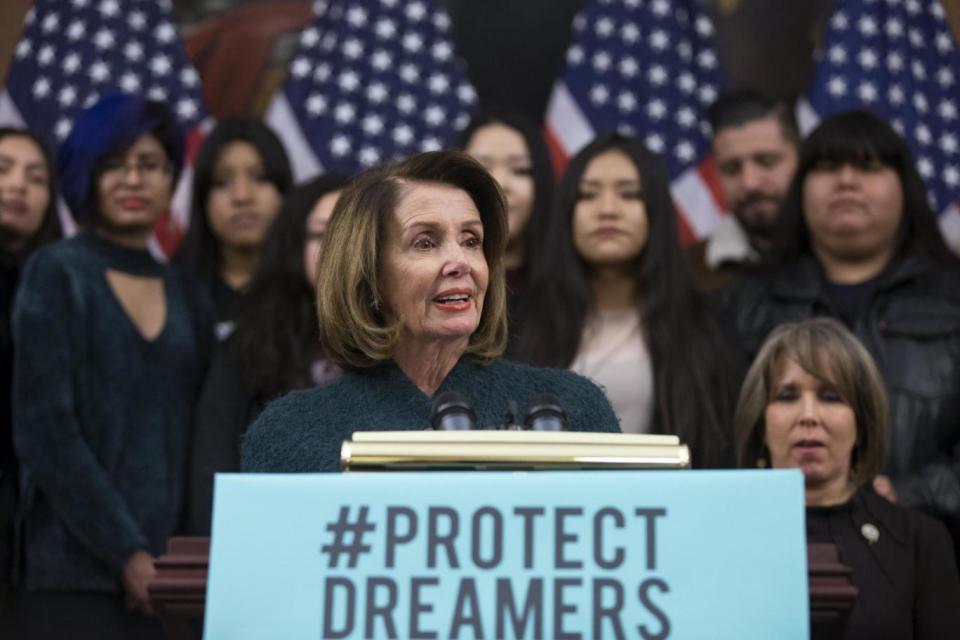 Row: Nancy Pelosi, with DACA recipients, urges Congressional action for 'Dreamers' (EPA)