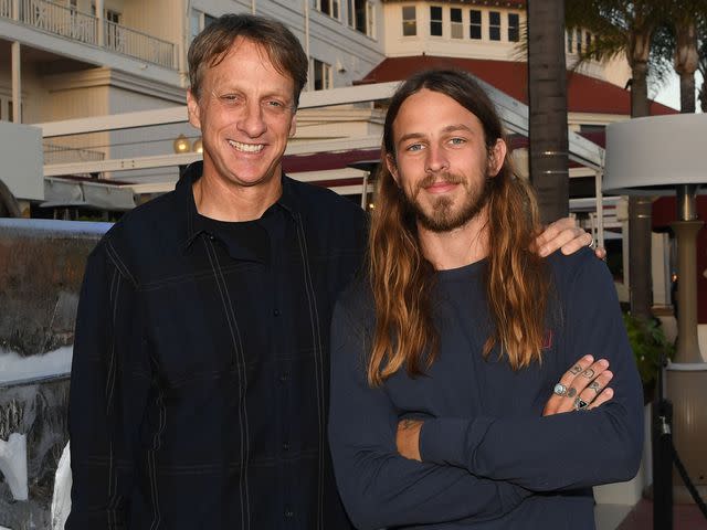 <p>Denise Truscello/Getty</p> Tony Hawk and Riley Hawk attend opening weekend of Serea restaurant at Hotel Del Coronado on June 29, 2019 in Coronado, California.