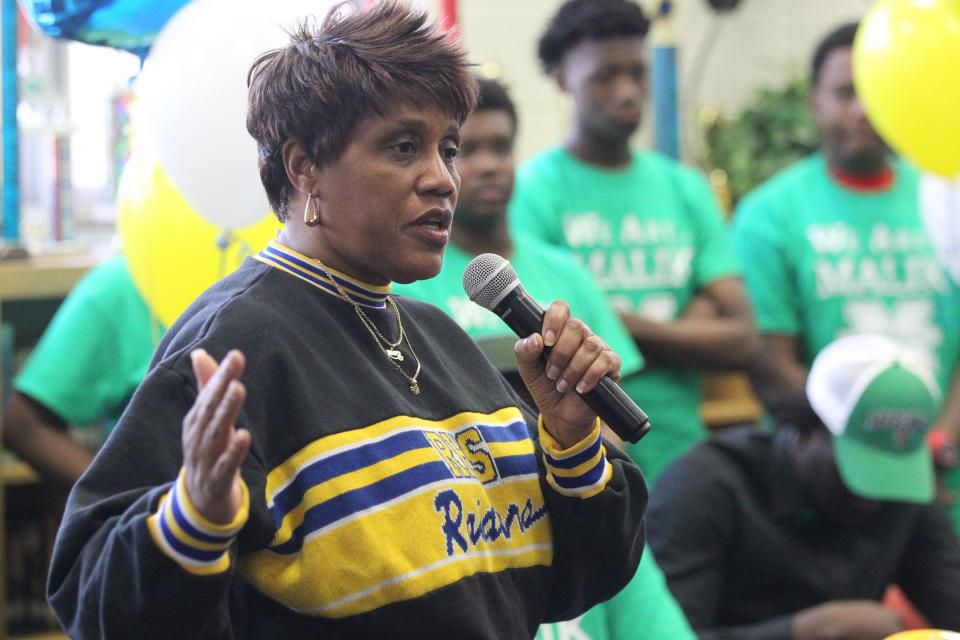 Rickards athletic director Claudette Farmer talks during signing ceremonies on National Signing Day, Feb. 6, 2019.