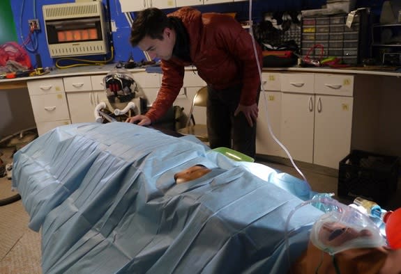 Anesthesiologist Matthieu Komorowski, from Lille 2 University in France, with a mannequin used to demonstrate medical procedures.