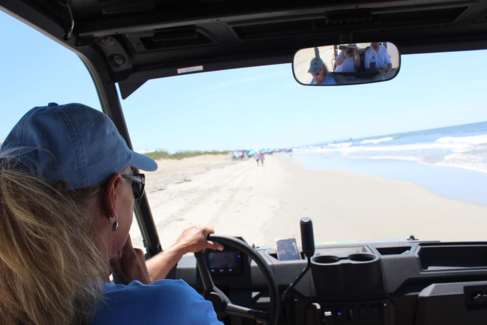 Cynthia Grant patrols the strand in a UTV during a recent shift with Oak Island's Beach Services Unit.