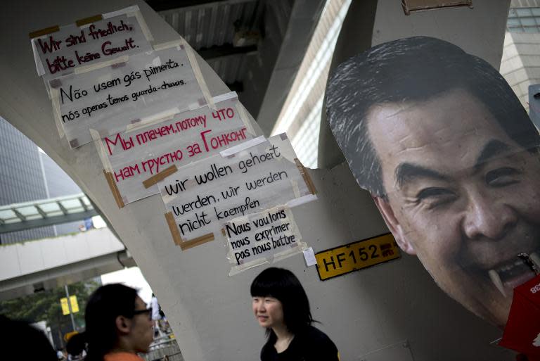 A poster of Hong Kong Chief Executive Leung Chun-ying with vampire fangs is pictured near the central government offices in Hong Kong on September 30, 2014