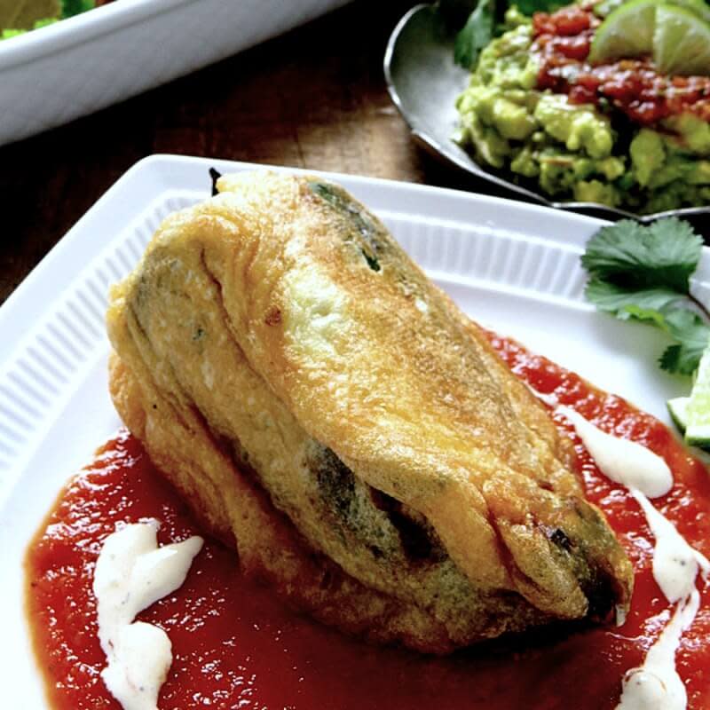 <p>Low Carb Maven</p><p>An authentic chile rellenos recipe filled with chorizo and cheese is a great twist on a favorite restaurant dish. </p><p><strong>Get the recipe: <a href="https://www.lowcarbmaven.com/chorizo-chile-rellenos/" rel="nofollow noopener" target="_blank" data-ylk="slk:Chorizo Chile Rellenos;elm:context_link;itc:0;sec:content-canvas" class="link rapid-noclick-resp">Chorizo Chile Rellenos</a></strong></p>