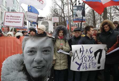 People attend a rally in memory of Russian opposition politician Boris Nemtsov, who was assassinated in 2015, in Moscow, Russia February 24, 2019. REUTERS/Tatyana Makeyeva