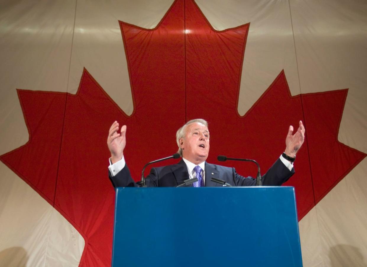 Former prime minister Brian Mulroney speaks to supporters in 2009 at a party marking the 25th anniversary of his landslide victory in 1984 in Montreal. Some N.W.T. leaders are remembering Mulroney fondly, while others feel differently about his legacy in the North. (Ryan Remiorz/The Canadian Press - image credit)