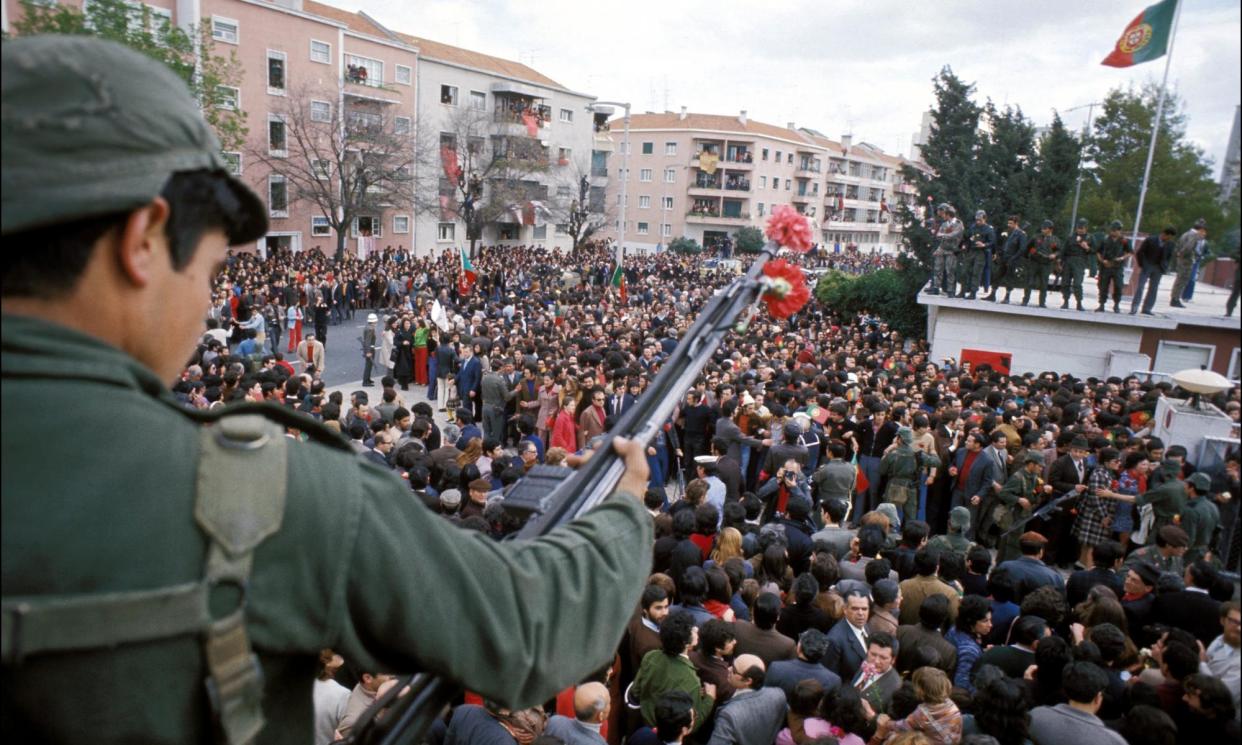 <span>Carnation revolution In Lisbon, Portugal 25 April 1974.</span><span>Photograph: Jean-Claude Francolon/Gamma-Rapho/Getty Images</span>