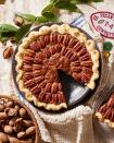 <p>Combine classic fudgy brownies with pecan pie for an indulgent treat! Best served warm with a scoop of ice cream after the big holiday meal.</p><p><strong><a href="https://www.countryliving.com/food-drinks/a37939418/pecan-brownie-pie-recipe/" rel="nofollow noopener" target="_blank" data-ylk="slk:Get the recipe for Pecan-Brownie Pie;elm:context_link;itc:0;sec:content-canvas" class="link ">Get the recipe for Pecan-Brownie Pie</a>.</strong></p>