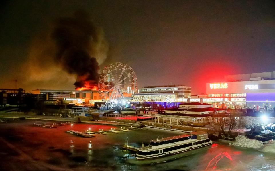 Crocus City Hall burns on March 22. The deadly terror attack on the edge of Moscow came just days after Vladimir Putin's sham re-election as Russian President