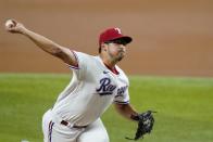 Texas Rangers starting pitcher Dane Dunning throws to an Arizona Diamondbacks batter during the first inning of a baseball game in Arlington, Texas, Tuesday, July 27, 2021. (AP Photo/Tony Gutierrez)