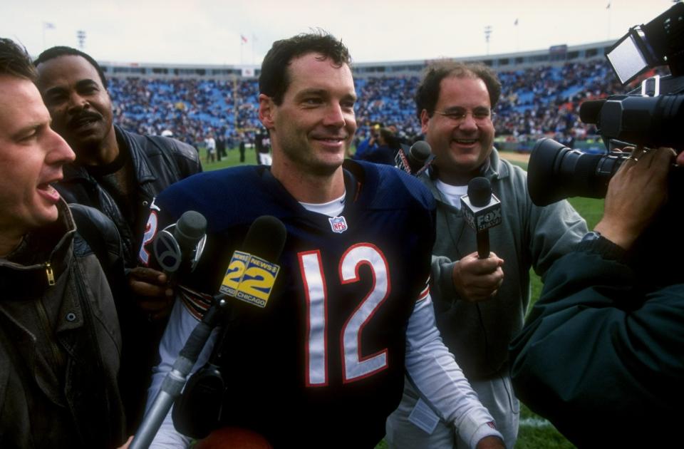 4 Oct 1998: Quarterback Erik Kramer #12 of the Chicago Bears talks to reporters following a game against the Detroit Lions at Soldier Field in Chicago, Illinois. The Bears defeated the Lions 31-27.